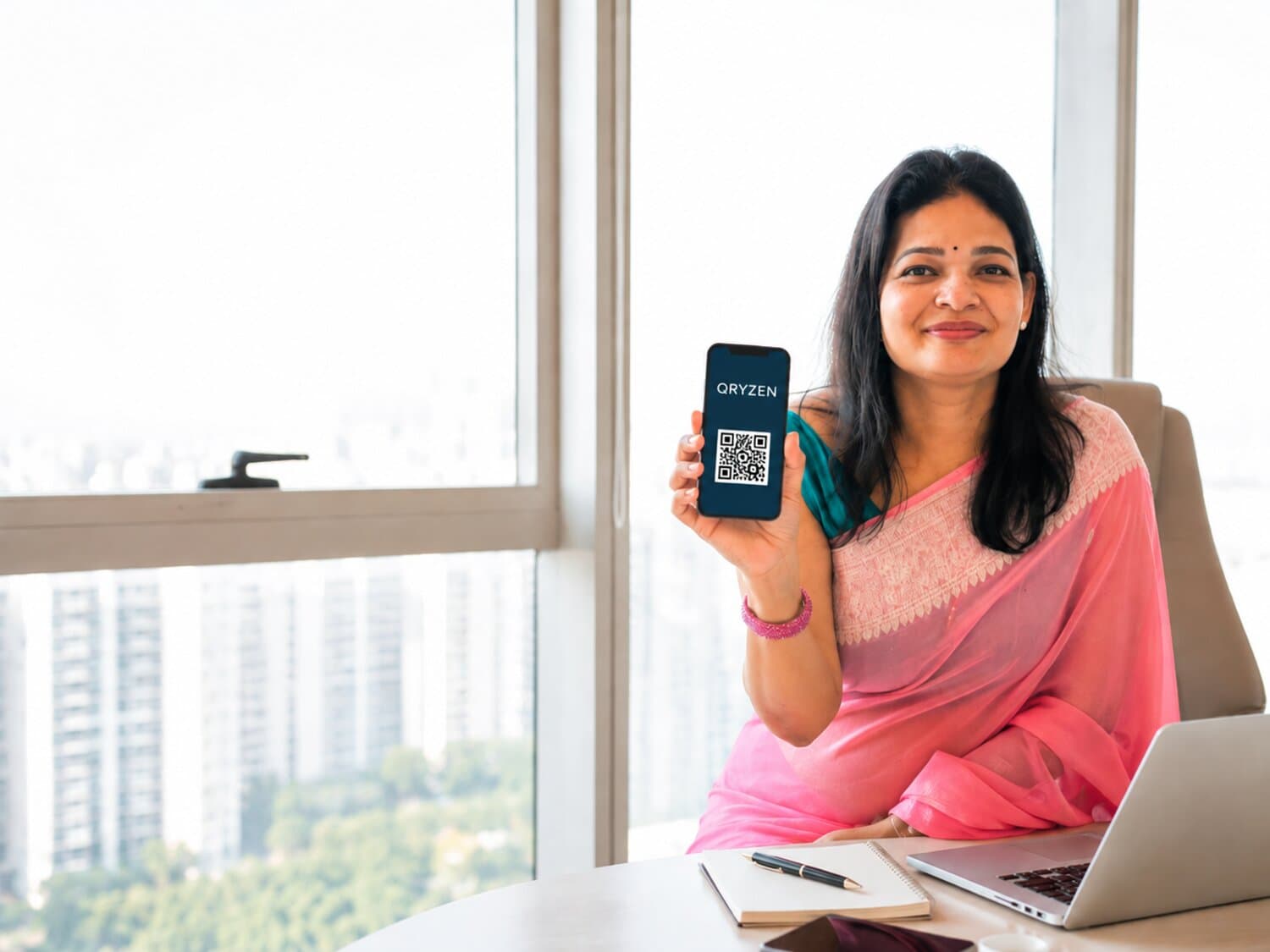 An entrepreneur sharing her details with a QRYZEN QR code